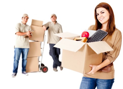 Moving team organizing furniture for local removals in Gideapark
