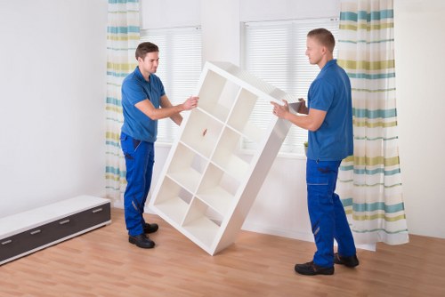 Packed boxes and fragile items prepared for flat removals in Gideapark